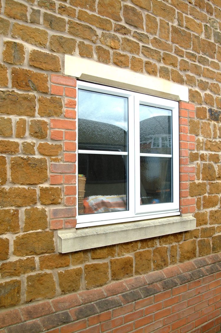 Small white casement window